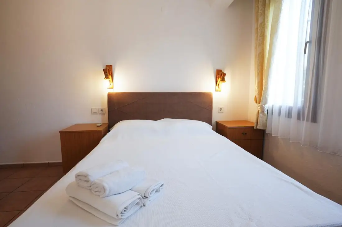 The hotel room and double bed